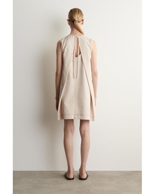 COS Natural V-Neck Open-Back Denim Mini Dress