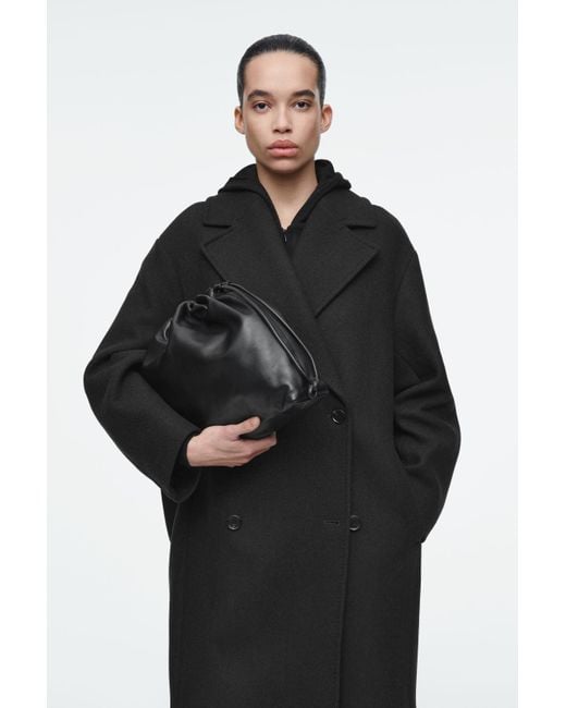 COS Black Cavatelli Clutch Bag