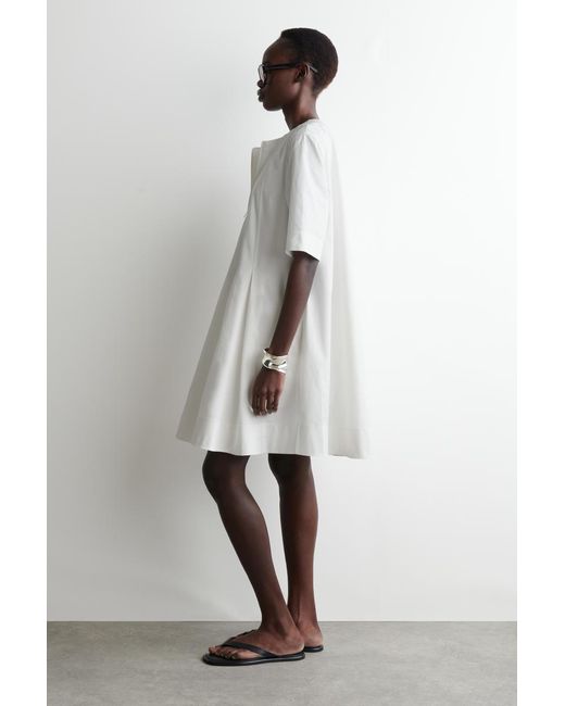 cos pleated zip up cotton mini dress COS Pleated Zip-Up Cotton Mini Dress in Black