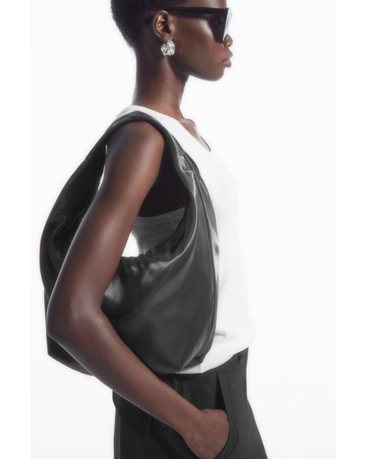 COS Black Mini Sling High-shine Shoulder Bag
