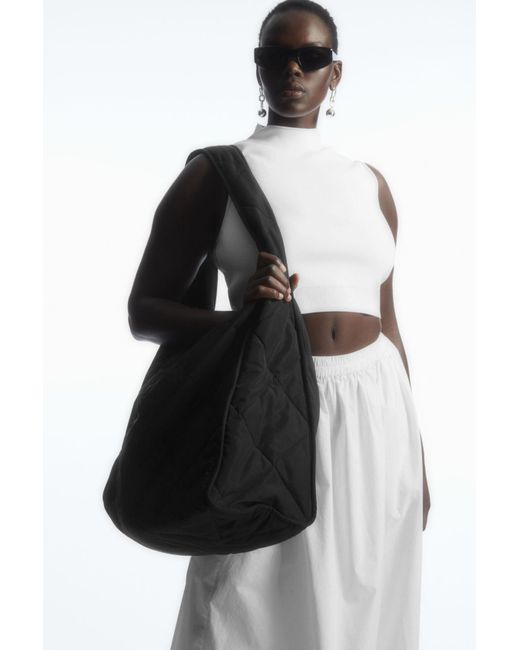 Cos oversized diamond quilted bag in black lyst