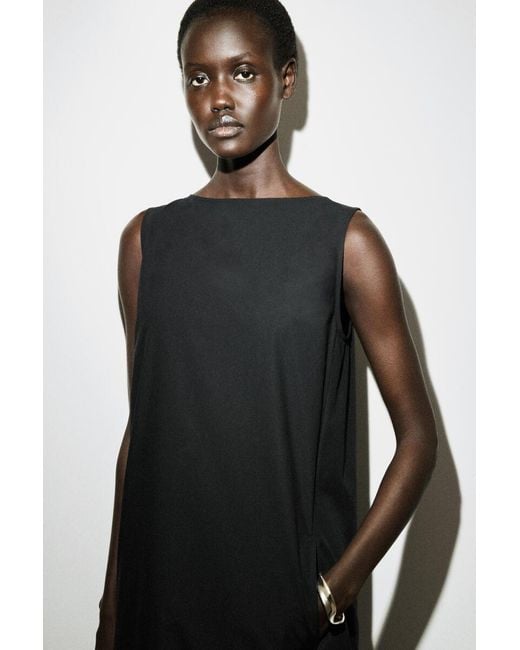 COS Black Dropped-Hem Cotton Midi Dress