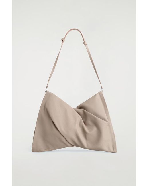 COS Natural Twisted Clutch Bag