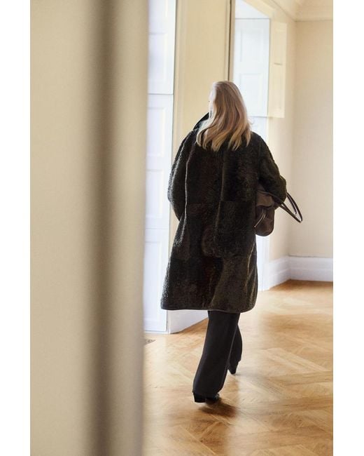 COS Green Leather-Bonded Shearling Long Coat