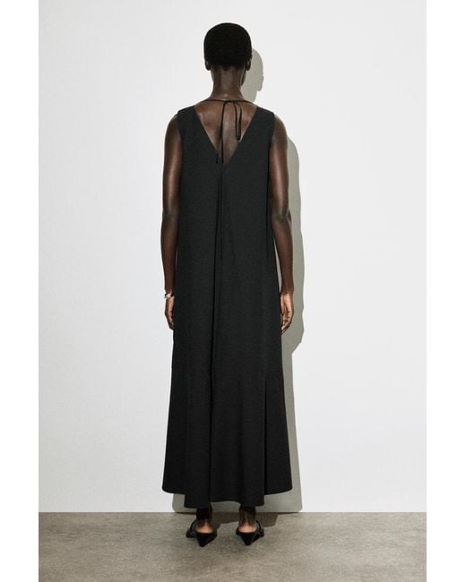 COS Black Dropped-Hem Cotton Midi Dress