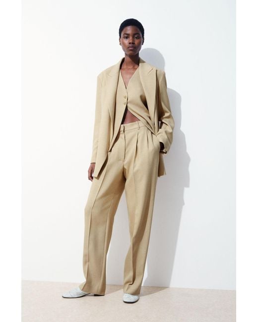 COS The Pleated Tailored Trousers in Natural | Lyst