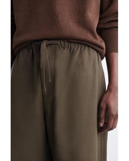 COS Green Relaxed-Fit Barrel-Leg Drawstring Trousers for men