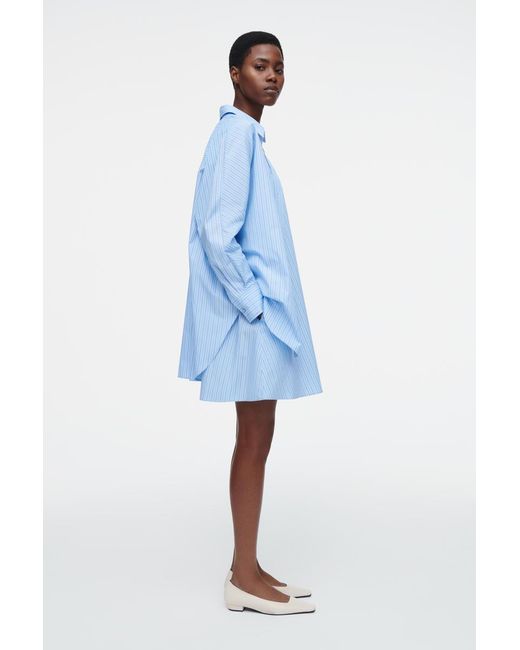 trapeze shirt dress White Poplin Rose Pocket This Whistles shirt dress features a striking floral print for a statement look Joseph Ribkoff Stretch Poplin Trapeze