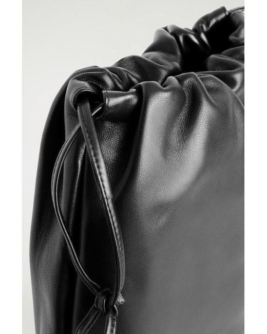 COS Black Drawstring Crossbody Bag