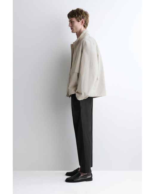 COS Black Elasticated Cotton Regular-Fit Tapered Trousers for men