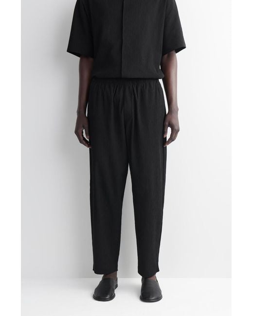 COS Black Crinkled-Cotton Relaxed-Fit Tapered Pants for men