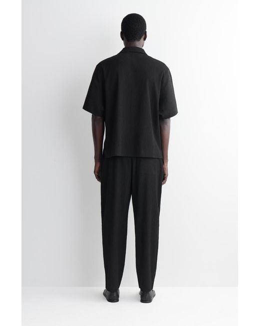 COS Black Crinkled-Cotton Relaxed-Fit Tapered Pants for men
