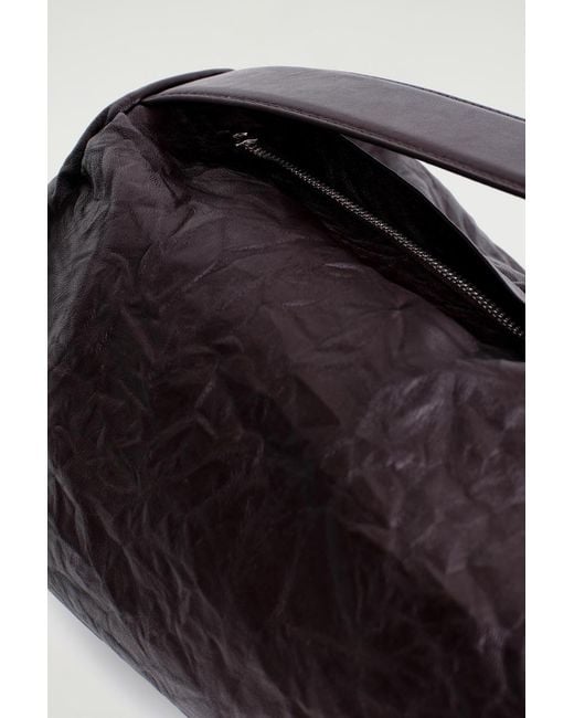 COS Brown Cylinder Clutch Bag