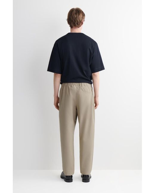 COS Natural Elasticated Cotton Regular-Fit Tapered Trousers for men