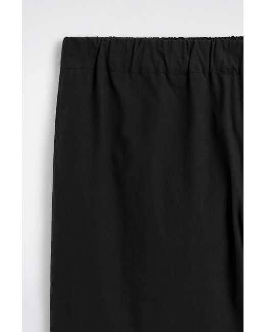 COS Black Elasticated Cotton Regular-Fit Tapered Trousers for men