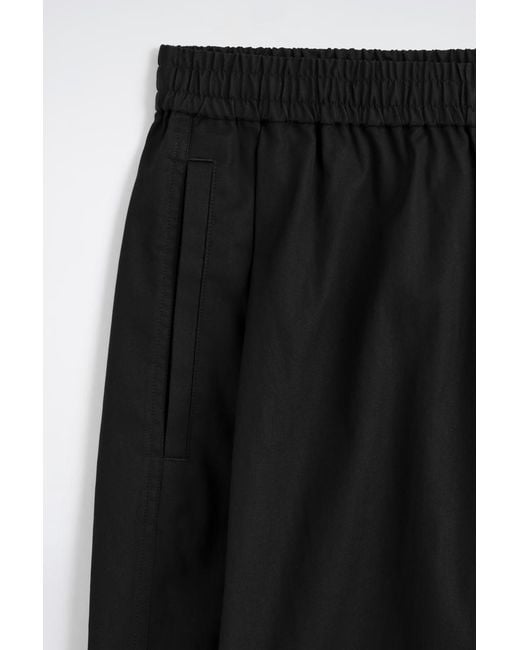 COS Black Cropped Elasticated Relaxed-Fit Wide-Leg Trousers for men