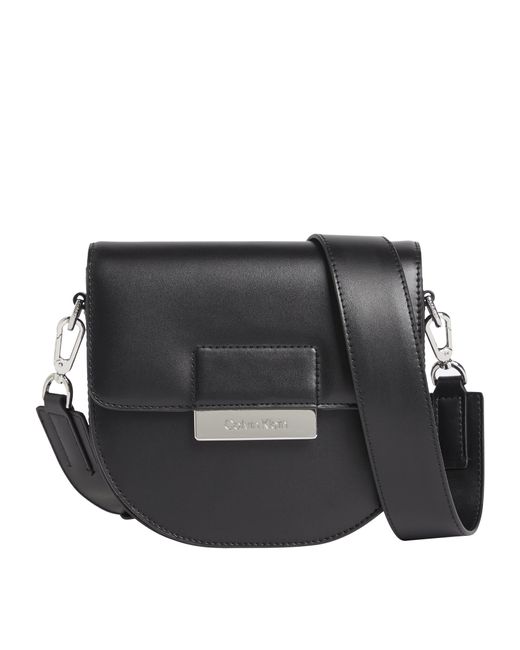 Calvin Klein Ck Core Saddle Bag Sm Handbag in Black | Lyst