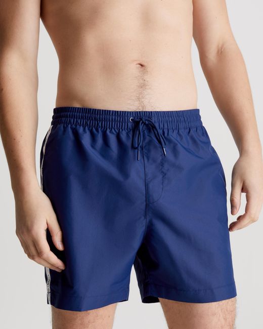 Calvin Klein Core Logo Tape Medium Drawstring Swimshorts in Blue for Men |  Lyst