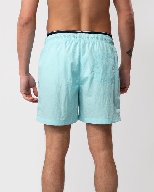 Calvin Klein Blue Ckj Monogram Nylon Medium Double Waistband Swimshorts for men