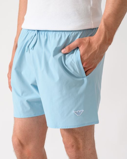 Emporio Armani Blue Swim Shorts With Eagle Logo for men