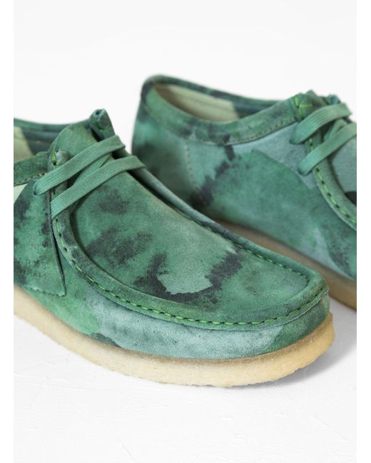 green suede wallabees