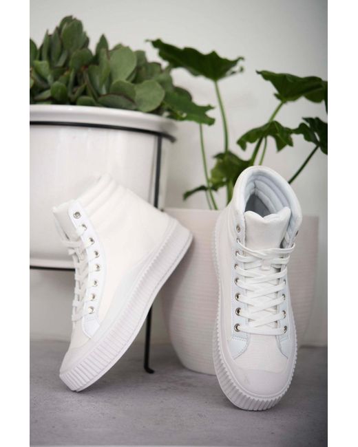 berness white sneakers