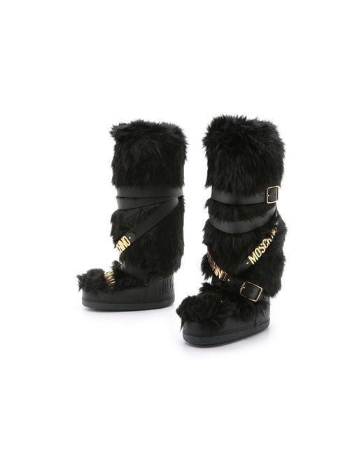 Moon boot discount moschino romania