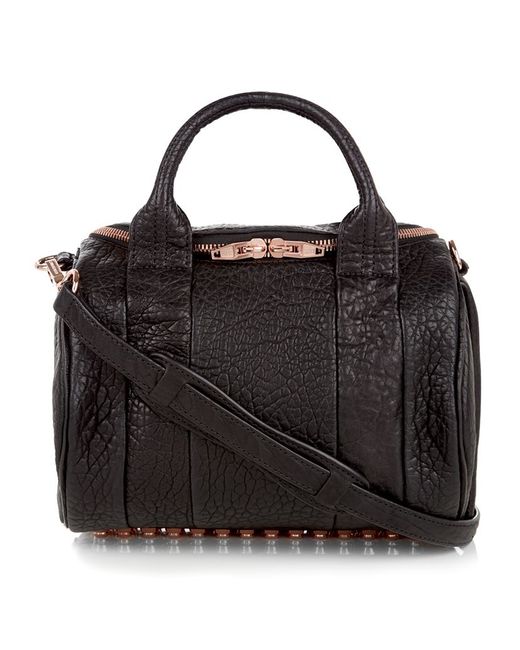 Alexander wang Rockie Rose Gold Stud Duffle Bag in Black - Save 33% | Lyst