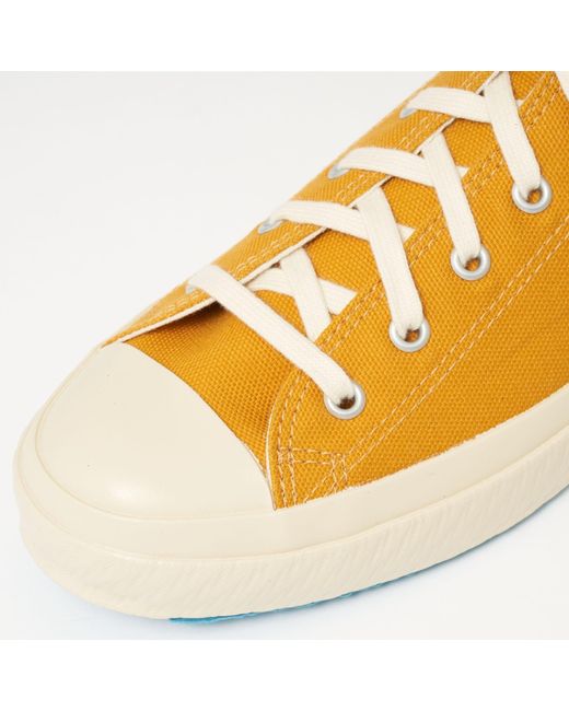 mustard yellow canvas shoes