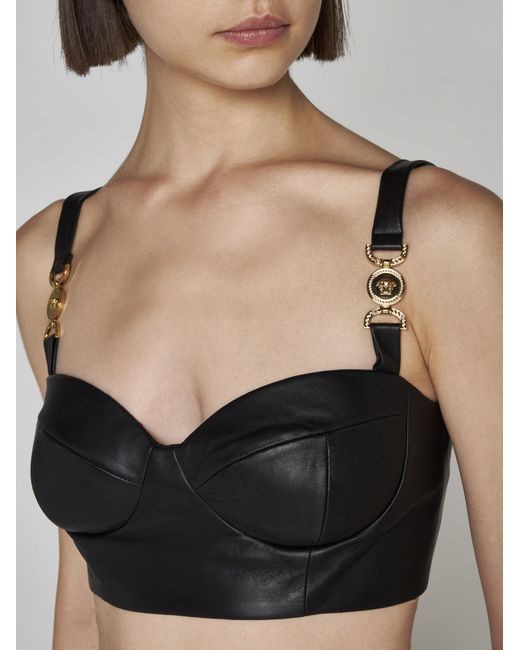 VERSACE Embellished jersey-paneled leather bustier top