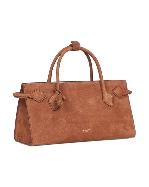 Tote Bag East West Le Teckel di Alaïa in Brown