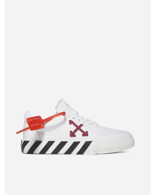 off white canvas low top sneakers