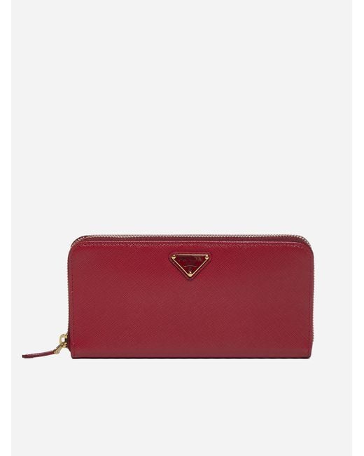 Prada Saffiano Leather Zip Around Wallet in Red | Lyst