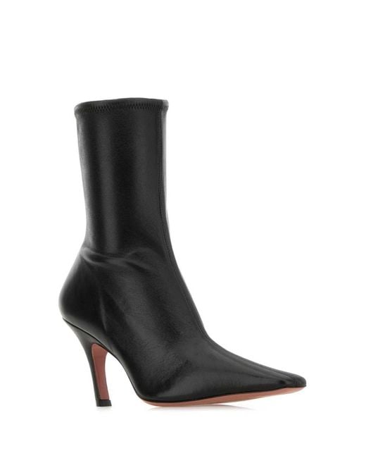 AMINA MUADDI Black Solid Pointed Toe Boots