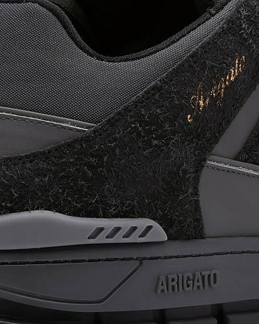 Axel Arigato Black Solid Round Toe Sneakers for men