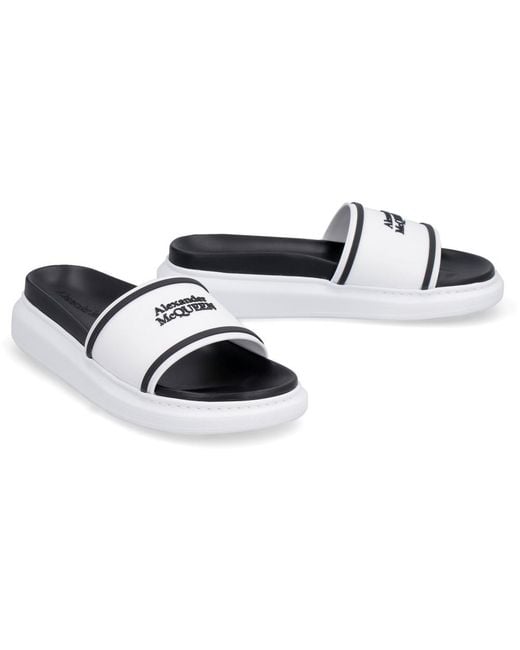 McQueen White Logo Slides