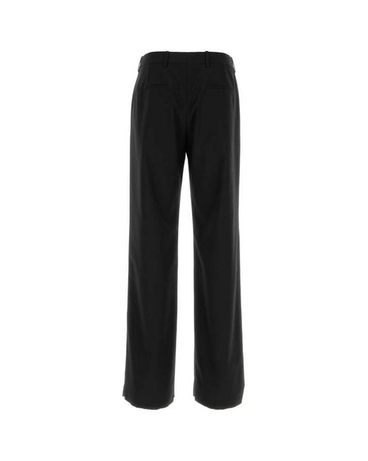 Gucci Black Flat Front Pants for men