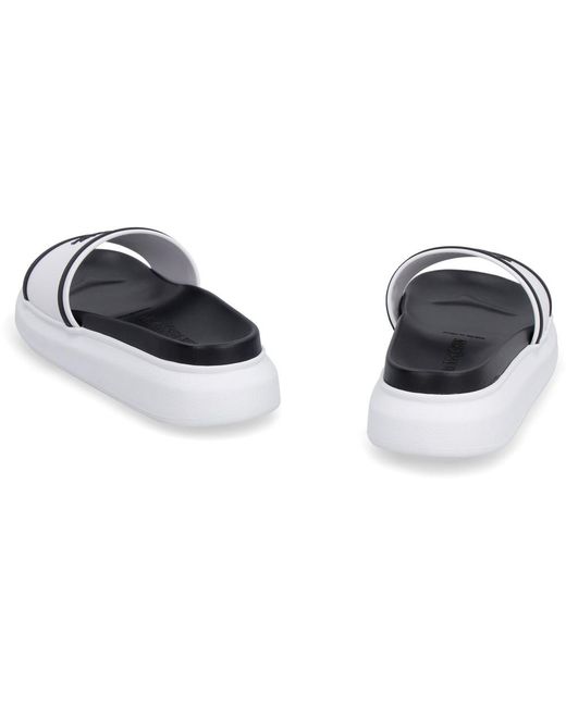 McQueen White Logo Slides