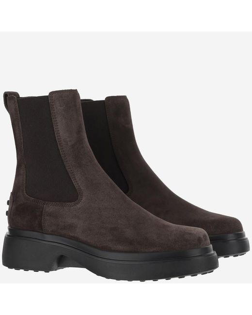 Tod's Black Bronw Ankle Boots With Elastic Details On The Side And Chunky Sole