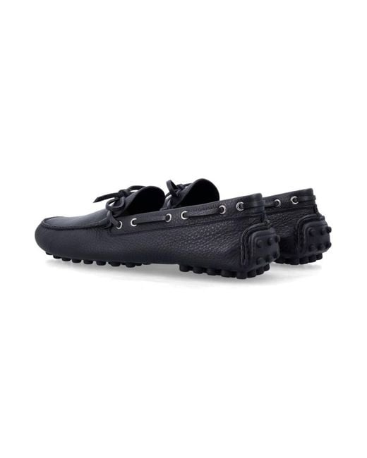 Prada Black Solid Grid Loafers for men