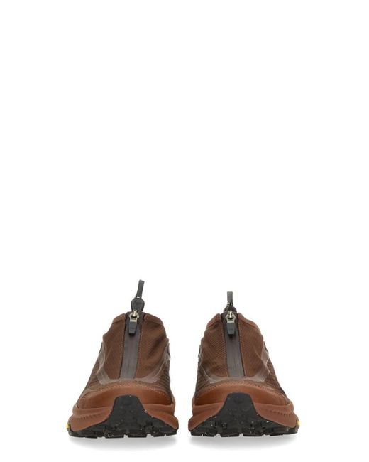 Hoka One One Brown Solid Sneakers for men