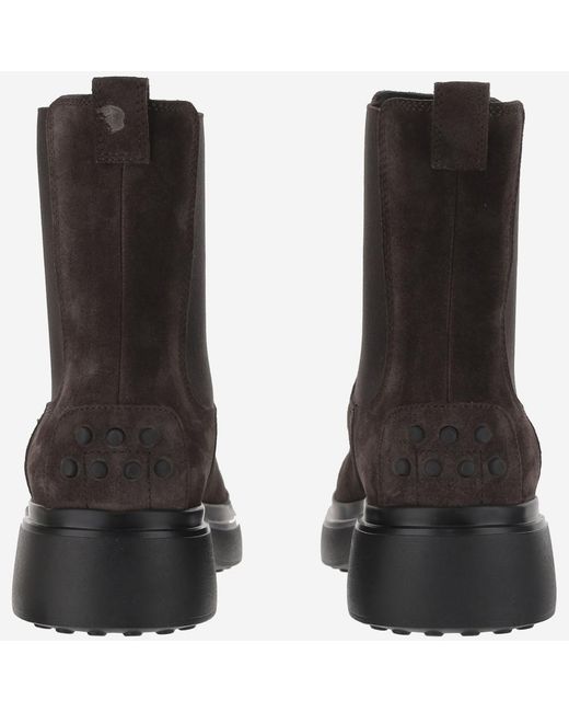 Tod's Black Bronw Ankle Boots With Elastic Details On The Side And Chunky Sole