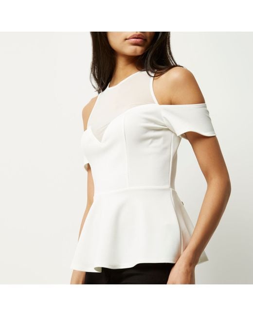 Product Tags White Mesh Peplum Cut Out Romper; Sku # White Mesh Peplum Cut Out Romper. Regular Price: $ Flawless babe! A gorgeous romper with a see through mesh top bodice and square pattern. Features a flattering pointed stretch knit peplum bottom with a back cut out. Has a back zipper closure and flared silhouette.