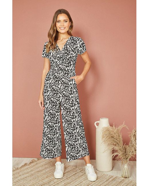 Mela Black And White Wrap Over Stretch Jumpsuit