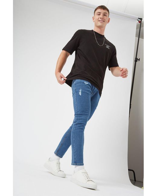 Burton Black Skinny Crop Mid Blue Rip Jeans for men