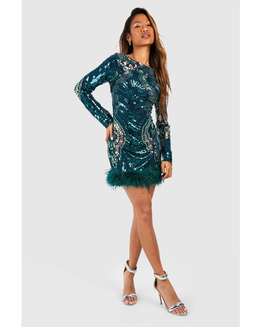 Emerald green sequin long sleeve tassel hem hot sale bodycon dress