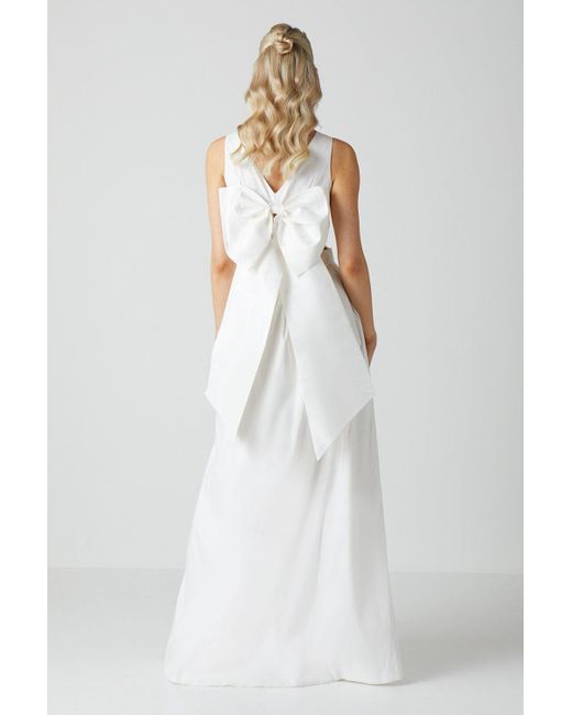 Coast Wrap Front Full Skirted Wedding Dress With Taffeta Bow in