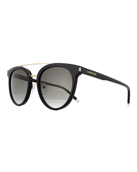 Calvin Klein Round Black Grey Gradient Ck4352s Sunglasses