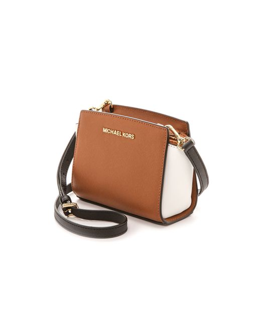 MICHAEL Michael Kors Selma Mini Messenger Bag  Brown messenger bag, Mini  messenger bag, Brown leather messenger bag