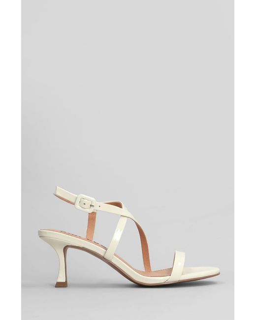 Bibi Lou Nica 65 Sandals In White Patent Leather